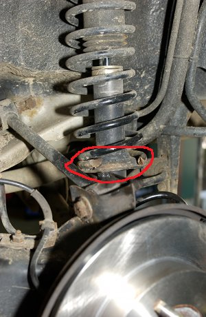 Broken suspension spring discovered during brake inspection in Southampton NY.